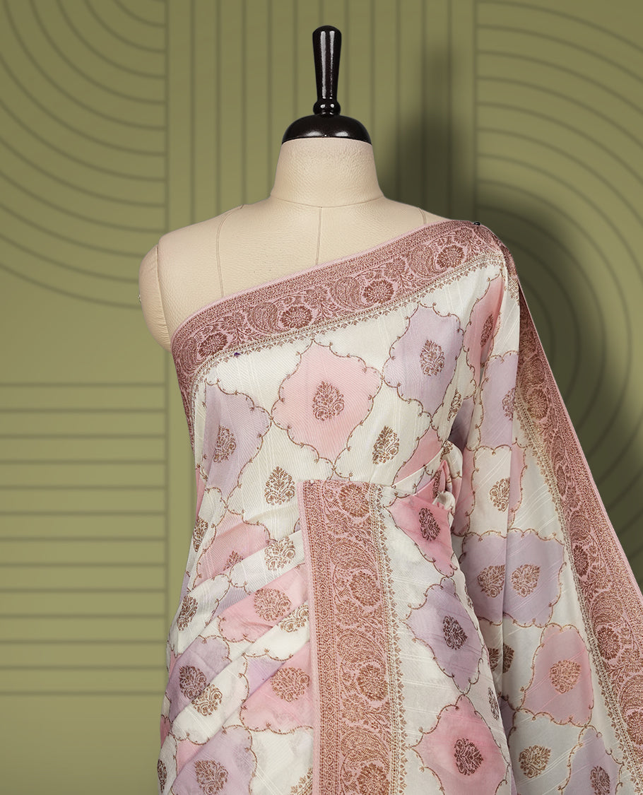 Pastel cream colour semi Banarasi Tussar Georgette saree with blush pink and lilac zari floral motifs, ornate dusty rose border and rich pallu & Includes a matching unstitched blouse piece to complete the look.