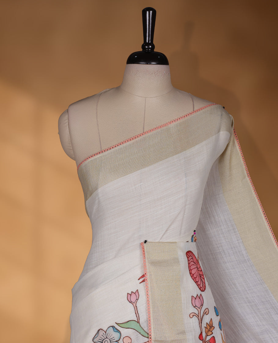 Cream colour cotton linen silk saree featuring Floral  & brids printed pattern on body, golden simple border with Peach colour pallu and comes with a matching blouse