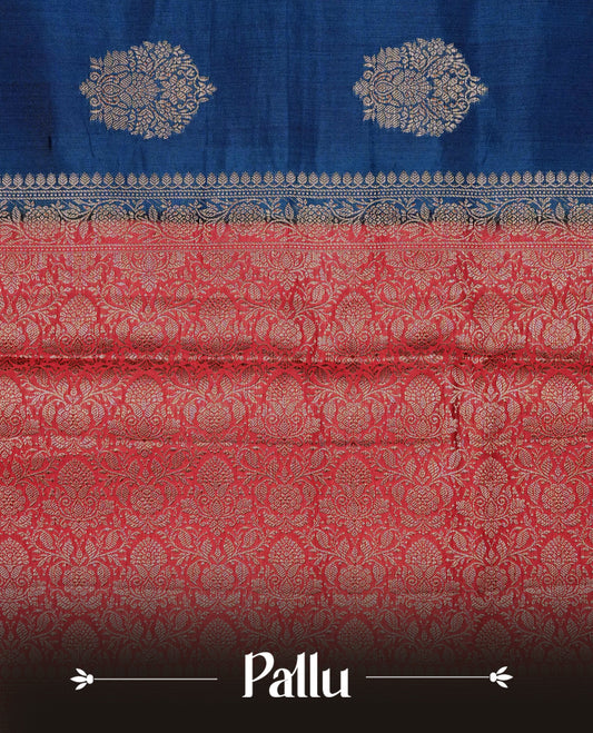 Teal blue colour banaras saree featuring gold zari motifs on body, complemented by contrast Maroon colour with gold zari border, comes with matching blouse piece.