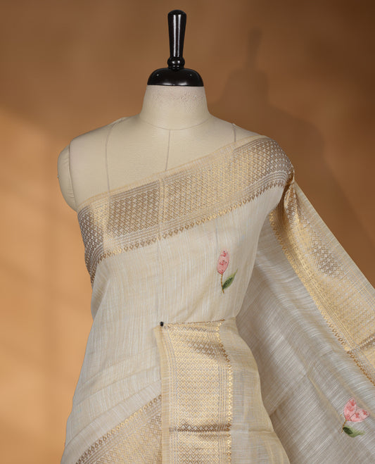 Beige colour Banarasi linen silk saree featuring hand brushed colour with Floral  & birds printed pattern on body, gold zari woven geometric design border with self colour pallu and comes with a matching blouse