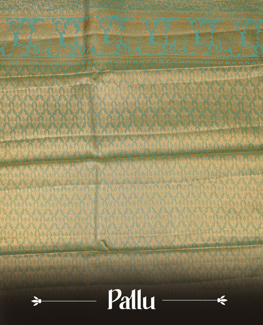 Green & Gold double shade colour Semi tissue silk saree featuring gold zari kodi floral motifs on body, Contrast Green colour with traditional border, paired with matching blouse piece.