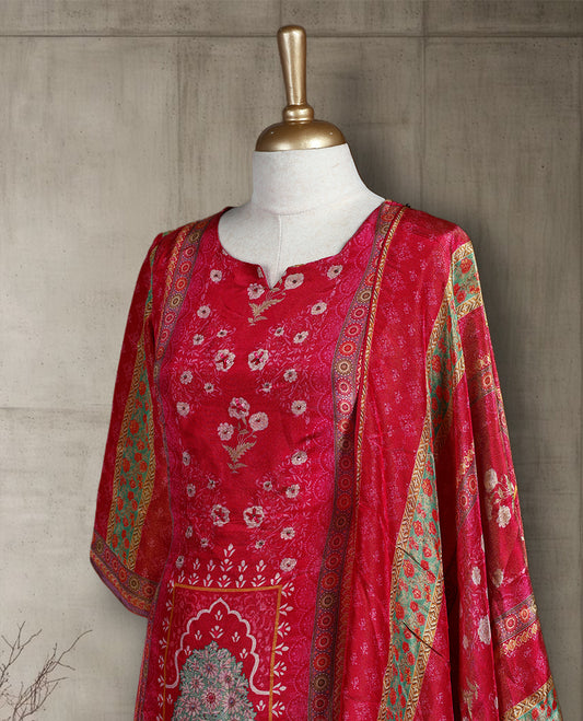 Dark red colour salwar from TWARA, featuring a delicate neck with floral work, all over on the top, paired with a matching bottom and an elegant dupatta.