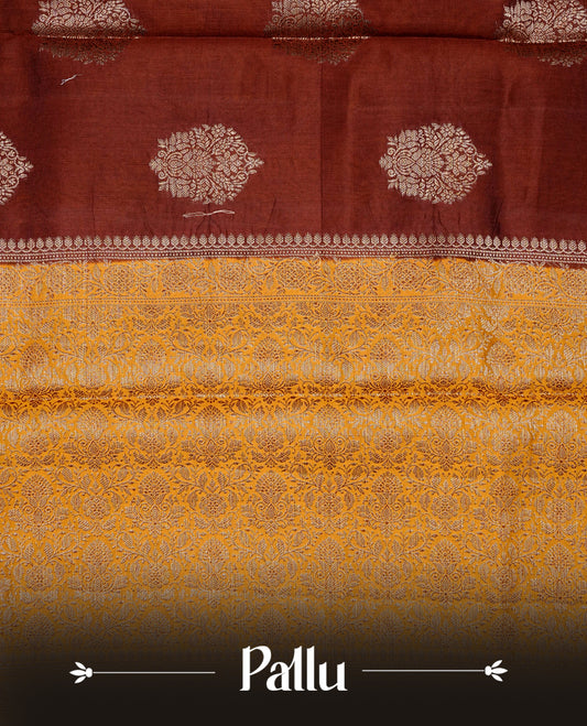 Chocolate colour banaras saree featuring gold zari motifs on body, complemented by contrast Mustard colour with gold zari border, comes with matching blouse piece.
