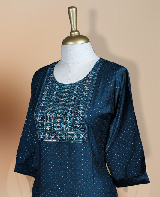 Navy blue colour kurthi adorned with intricate embroidery on the yoke and delicate dotted patterns all over, Designed with a round neckline and 3/4th sleeves, perfect for casual and semi formal occasions.