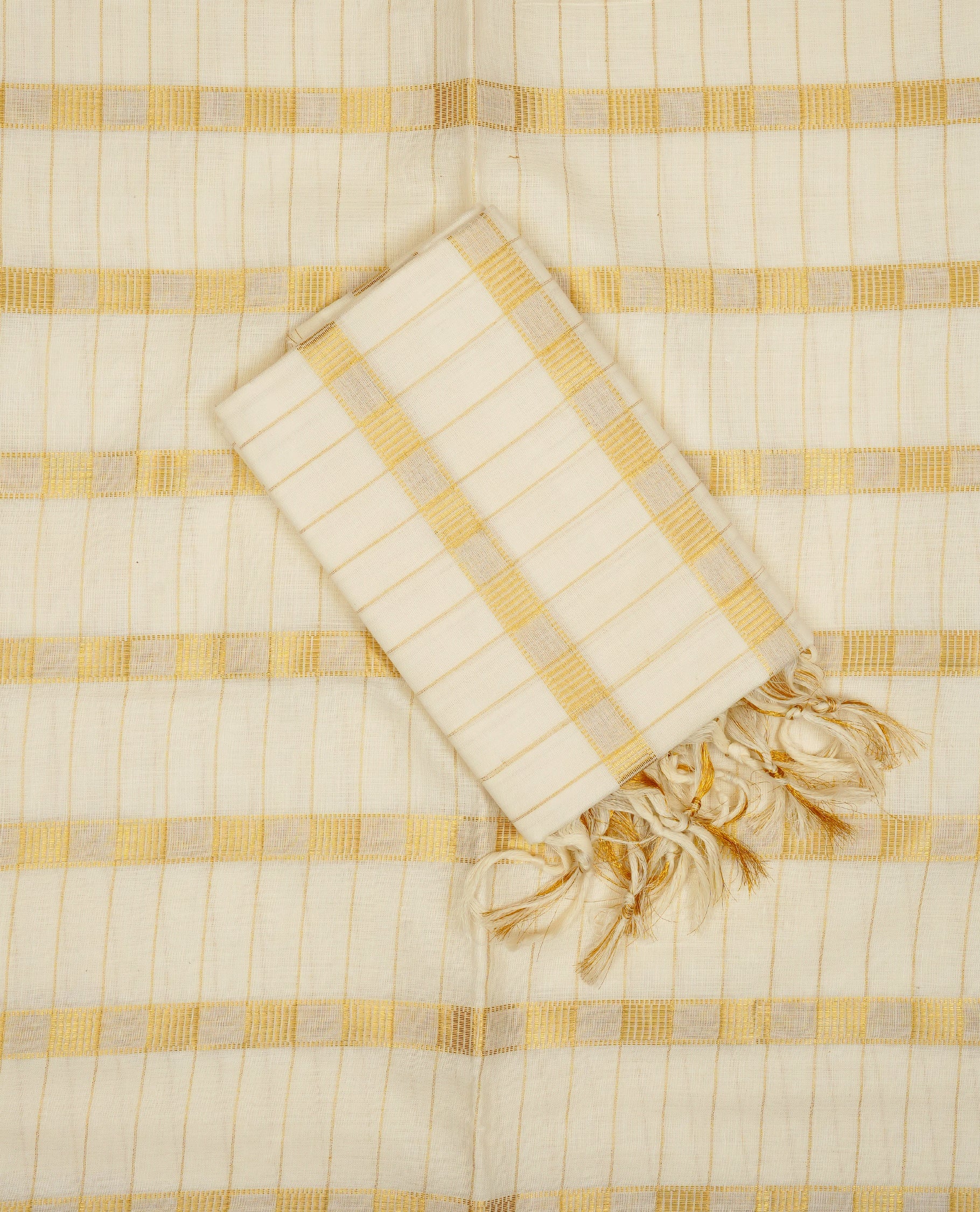 Cream colour Cotton set mundu With Gold zari Checks on body, enhance gold zari  kara.