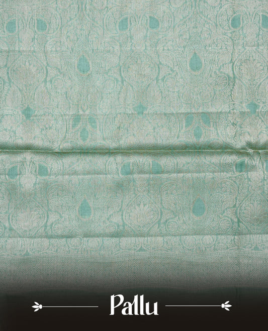 Pastel green Colour banaras saree featuring Light gold zari Floral kodi pattern on body, complemented by borderless finish, comes with matching blouse piece.