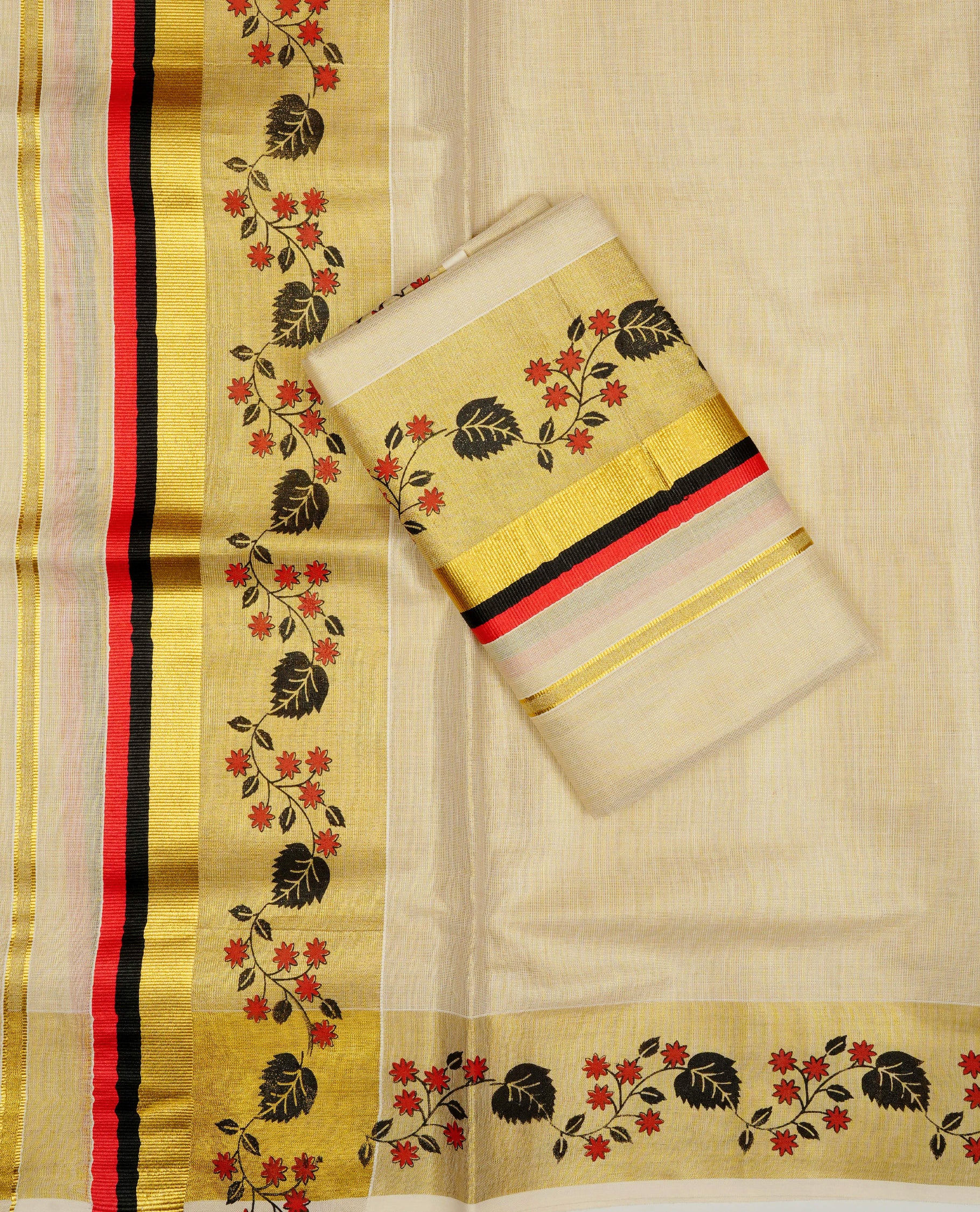 Cream Colour tissue set mundu featuring a plain body, enhanced with delicate red floral vine motifs & Black, Red & a gold zari kara.