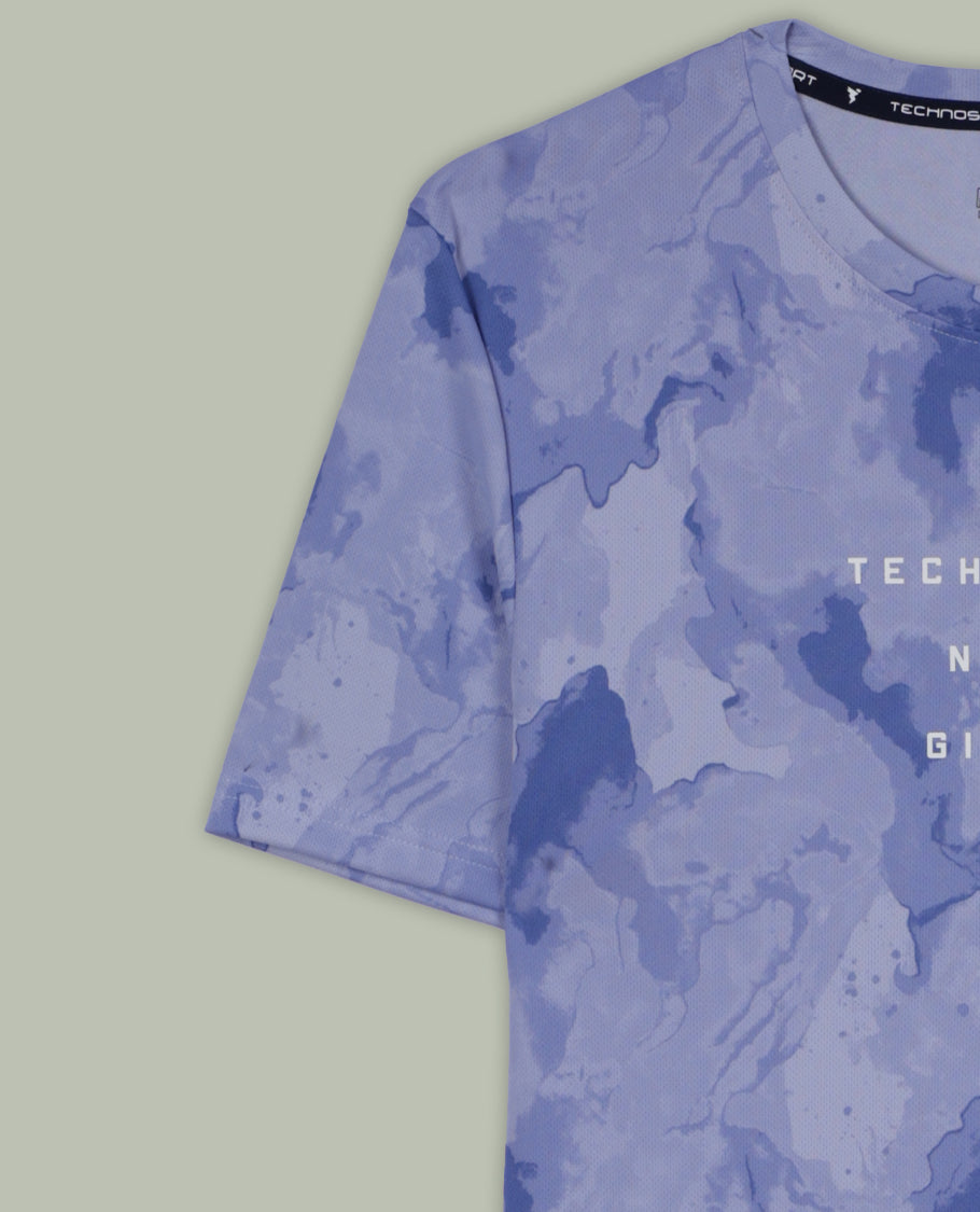 Pastel purple colour T shirt featuring a subtle self print design, comfortable short sleeves, and a classic round neck for a casual, stylish look.