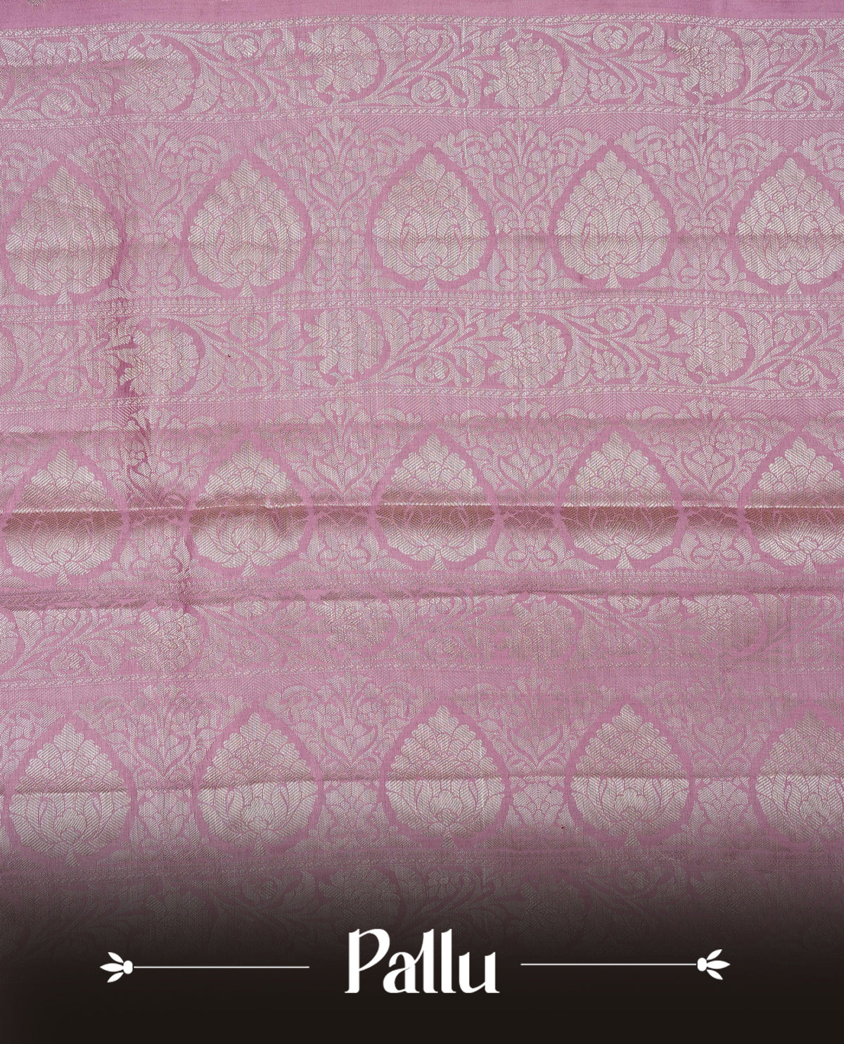 Light pink colour banaras saree featuring silver zari buttas on body, complemented silver zari on self colour border, comes with matching blouse piece.