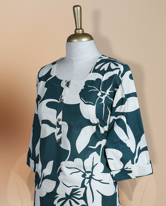Dark green and white kurthi featuring bold floral prints and a buttoned neckline & Designed with 3/4th sleeves and a straight fit, perfect for everyday comfort with a touch of modern style.