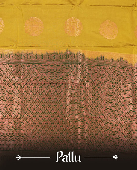Mustard green colour Semi Silk Saree with gold zari motifs on the body, paired with a contrast Dark green colour pallu with copper zari traditioal border, and a matching blouse piece.
