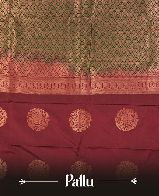 Dark green colour Semi Silk Saree with copper zari motifs on the body, paired with a contrast chocolate brown colour pallu with copper zari traditioal border, and a matching blouse piece.