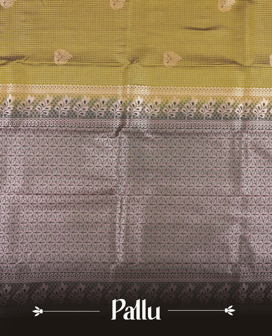 Olive brown colour Semi Silk Saree with copper zari checkered on the body, paired with a contrast Dark green colour pallu with Rose gold zari traditioal border, and a matching blouse piece.