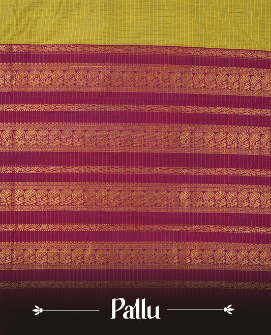 Yellow Green coloured mixed Kalyani cotton saree featuring golden zari checks on the body, complemented by a burgundy coloured border and pallu adorned with golden zari patterns, Paired with a matching blouse.