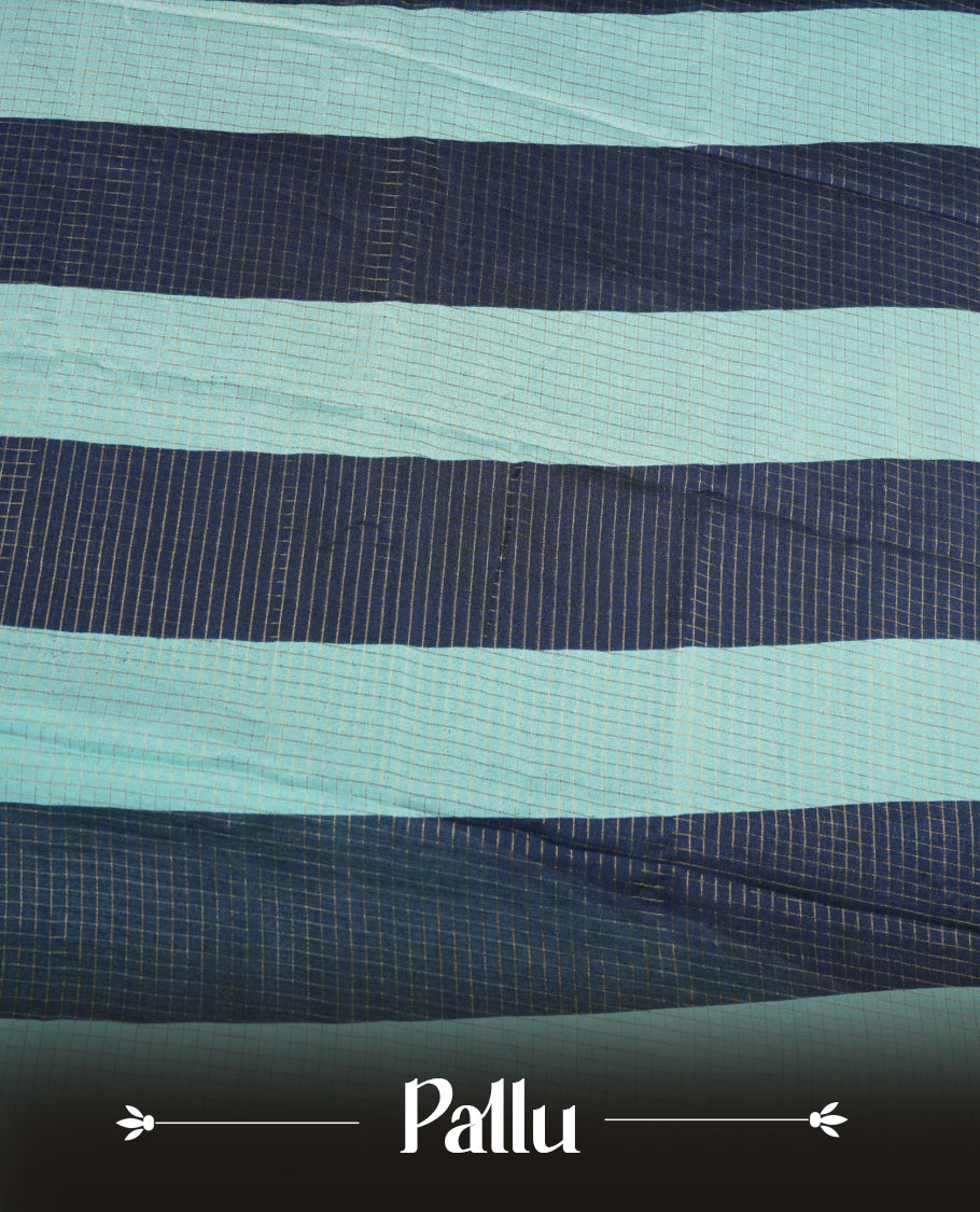 Navy Blue colour saree featuring fine check patterns on the body, paired with a Aqua Blue zari woven border and pallu. Comes with a matching blouse piece