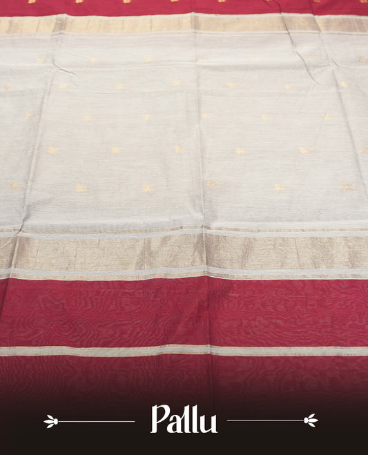 Maroon and pale gold Colour silk cotton saree with zari star buttas, antique gold tissue pallu, slim floral zari borders, and a plain pale gold blouse with matching border.