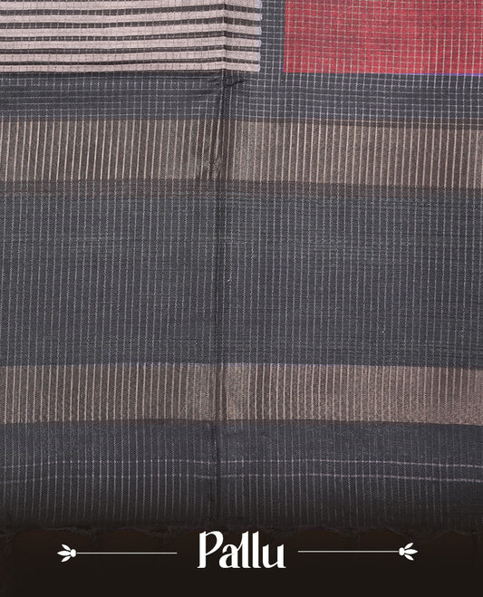 Soft charcoal grey colour semi tussar silk saree with fine striped texture and a subtle geometric body design. Finished with a classic striped pallu and tassel edges.