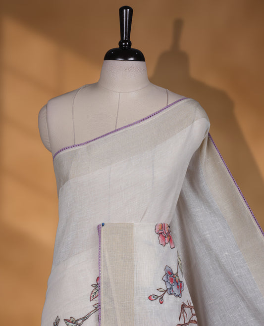Cream colour cotton linen silk saree featuring Floral  & brids printed pattern on body, golden simple border with lavender colour pallu and comes with a matching blouse