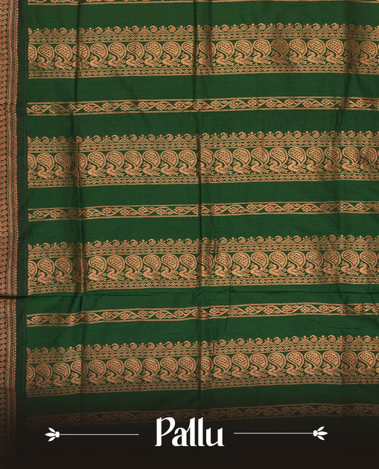 Mustard yellow colour Kalyani Cotton saree with rich green border and pallu, featuring copper zari peacock motifs and intricate weaving & Includes a matching blouse piece.