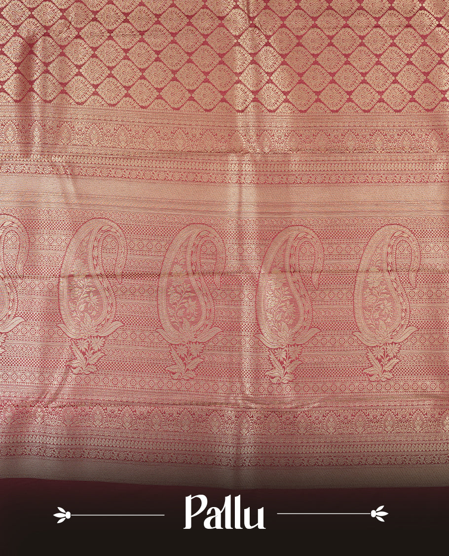 Deep brown colour semi silk brocade saree featuring intricate Gold butta patterns across the body, complemented by a rich self colour woven border and pallu, paired with a matching blouse.