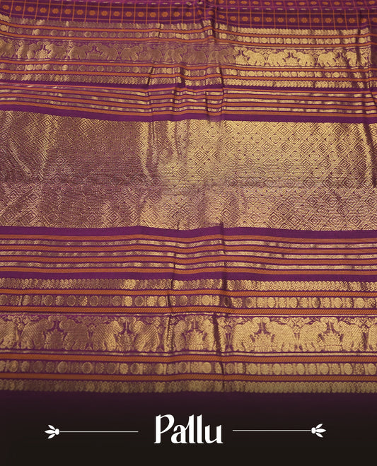 Maroon colour pure Kanchi cotton saree featuring golden checks with floral motifs, enhanced by a grand zari border woven with majestic elephant patterns, exuding elegance and tradition & Comes with matching blouse.