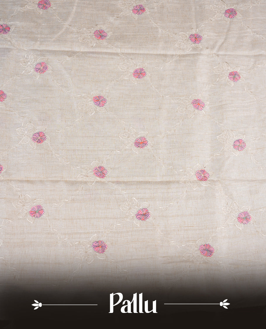 Cream colour semi tuseer silk saree featuring with Self colour thread embroidery kodi pattern & Pink colour floral thread motifs all over body, pallu, and paired with matching blouse piece.