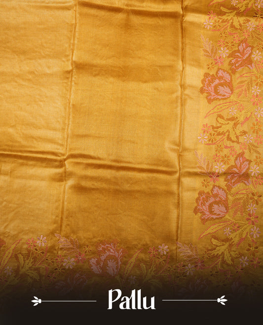 Mustard colour Pure tusser silk saree featuring finely crafted floral thread embroidery detailing on the border, pallu and with matching blouse piece.