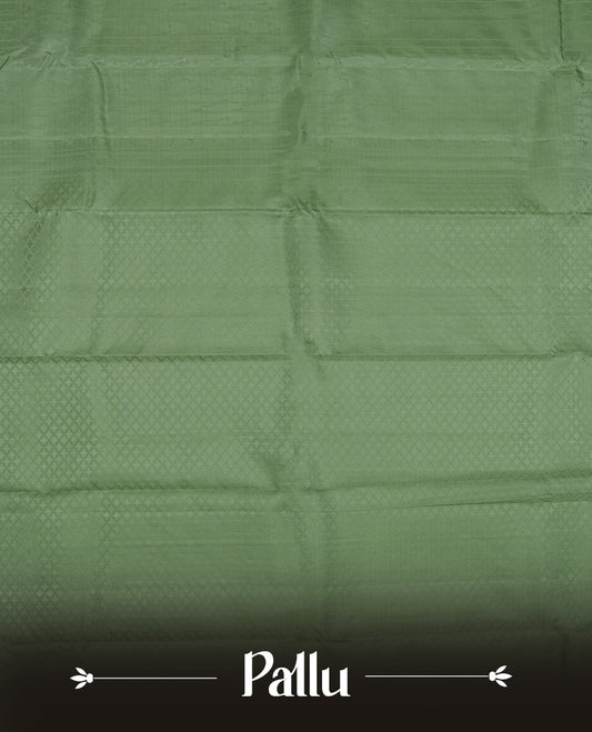 Dark pastel green colour semi soft silk saree featuring a self coloured patterned body, complemented by self coloured pallu & border and a matching blouse piece.
