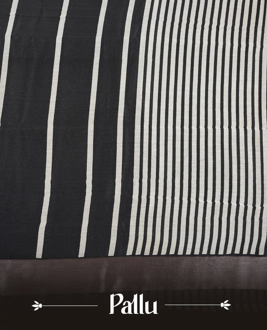 Black colour chanderi silk saree featuring white stripped print pattern across body, with Antique zari pattern border and paired with matching blouse.
