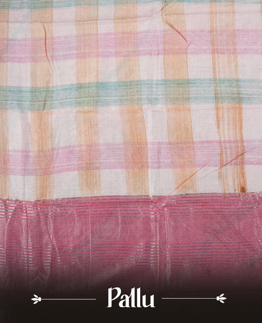 Pastel pink colour mixed chanderi cotton saree featuring checkered body, with silver zari border, and matching checkered blouse.