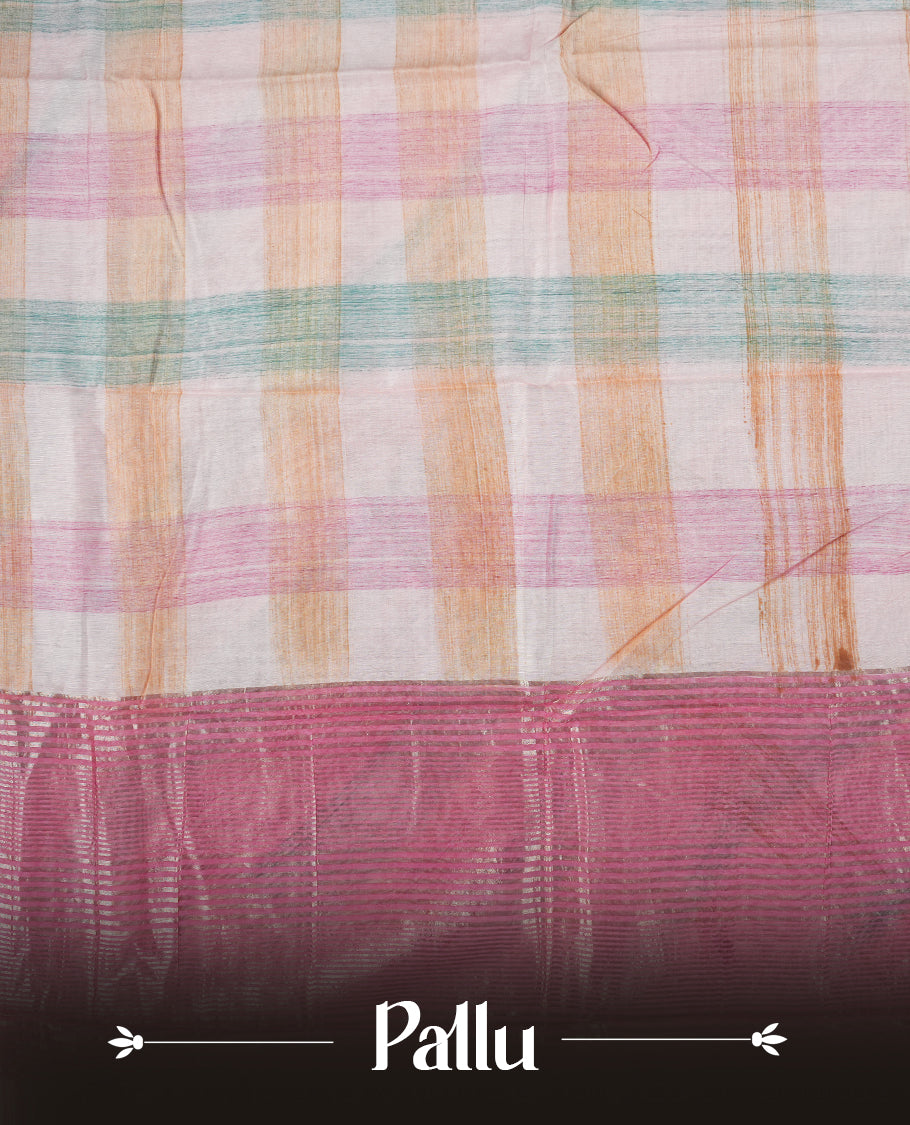 Pastel pink colour mixed chanderi cotton saree featuring checkered body, with silver zari border, and matching checkered blouse.