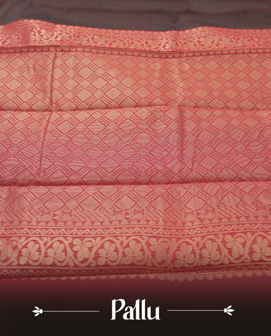 Black & Grey colour tissue cotton saree featuring elegant silver & copper zari motifs, a delicate zari border, and a beautifully woven pallu & Paired with a matching blouse, perfect for festive and traditional occasions.