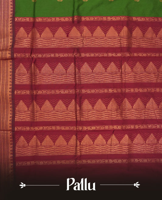 Olive green  colour Kalyani Cotton saree with maroon border and temple motifs on pallu, adorned with copper zari motifs and intricate weaving & Comes with a matching blouse piece.