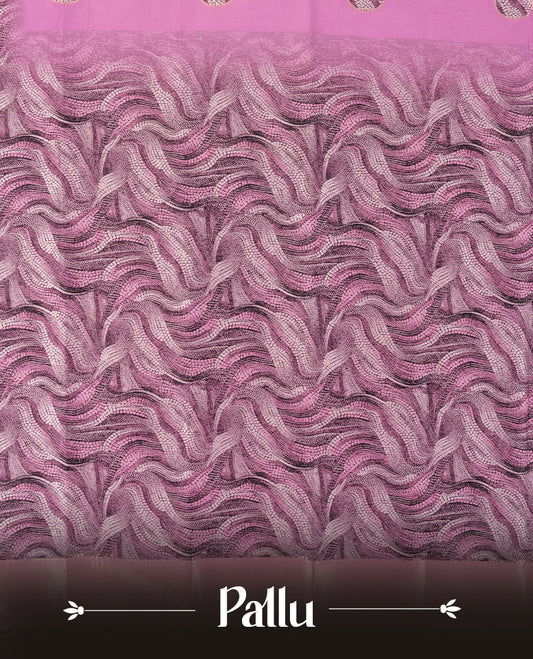 pink semi silk saree featuring elegant circular motifs on the body, complemented by a striking pallu adorned with intricate wavy white thread patterns with golden border, and paired with a matching blouse