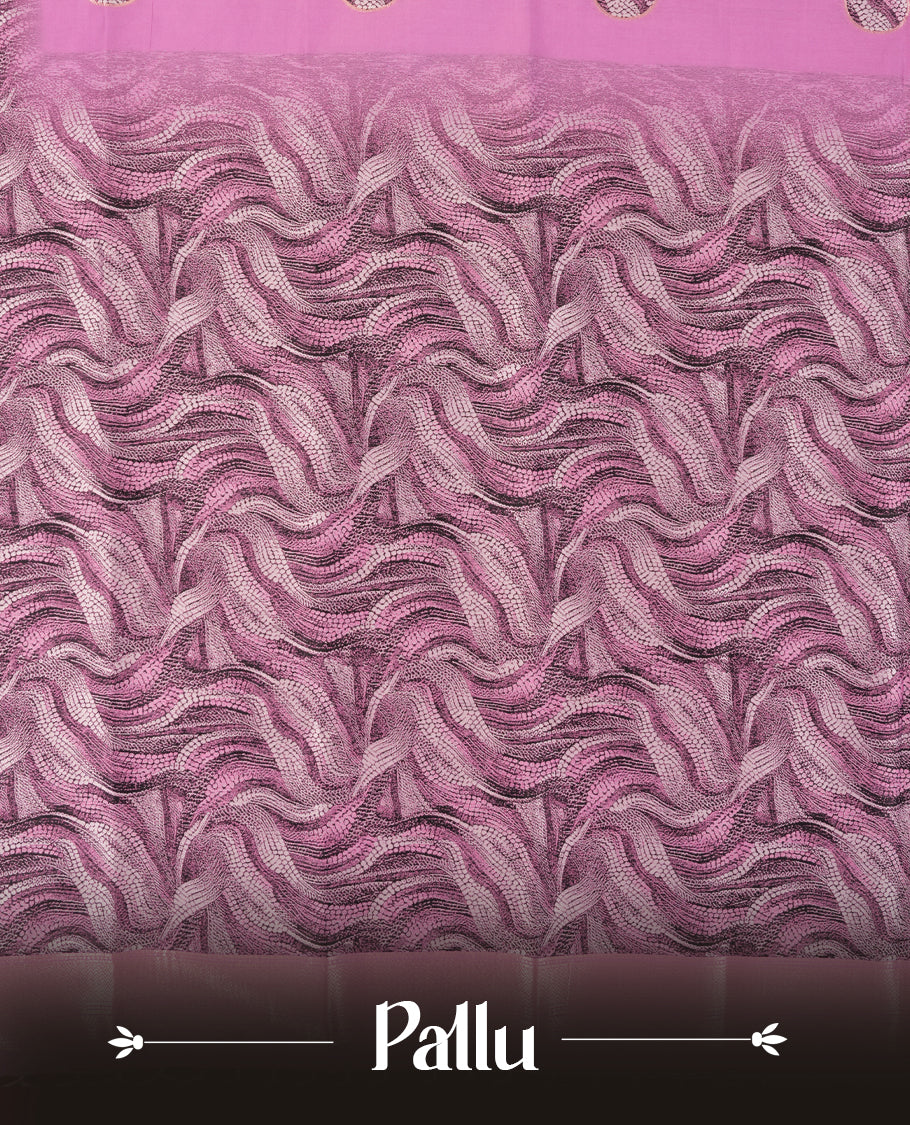 pink semi silk saree featuring elegant circular motifs on the body, complemented by a striking pallu adorned with intricate wavy white thread patterns with golden border, and paired with a matching blouse