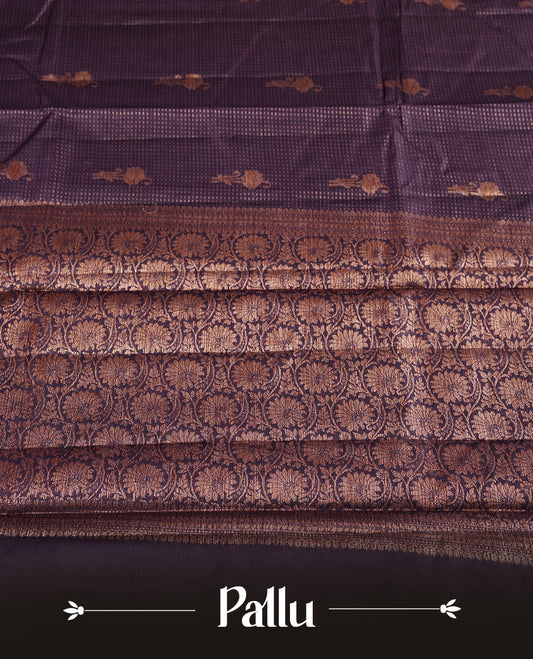 Cyber grape colour pure banarasi tussar Saree with antique design & golden motifs on the body, accentuated with an elegant traditional border, rich woven pallu and matching blouse piece.