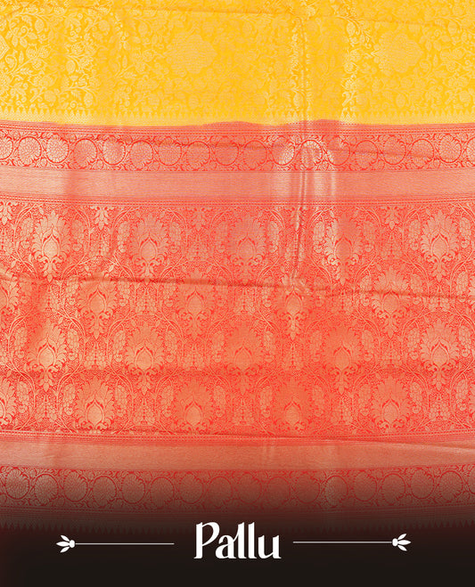 Yellow colour semi silk brocade saree featuring intricate Gold Floral kodi patterns across the body, complemented by a Contrast red colour woven border and pallu, paired with a matching blouse.