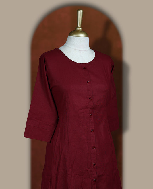 Deep maroon colour cotton coord set featuring a button down kurta with 3/4 sleeves and matching straight pants.
