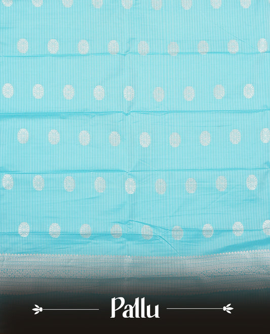 Bright light blue colour Semi Silk Saree with silver zari checks on the body, complemented by a self coloured pallu and border woven in silver zari, paired with a matching blouse piece.