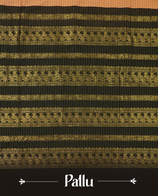 Burnt orange coloured mixed Kalyani cotton saree featuring golden zari checks on the body, complemented by a black coloured border and pallu adorned with golden zari patterns, Paired with a matching blouse.