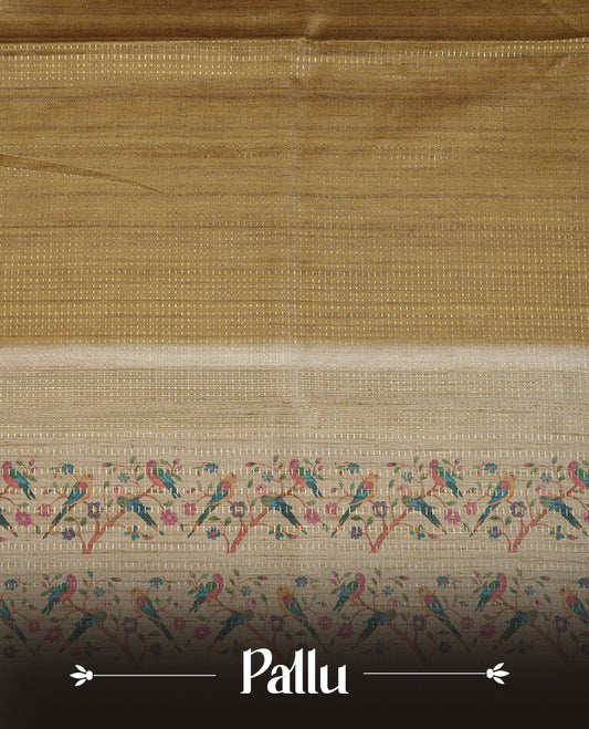 Olive colour tussar saree featuring golden zari dot stripped pattern on the body, complemented by a contrast cream colour mutlicolour floral kodi & animal print on border & pallu, paired with a matching blouse.