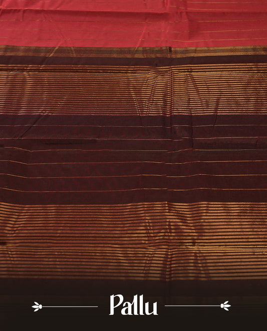 Maroon colour silk cotton saree featuring with delicate vertical copper zari lines on the body, Crafted without a border for a classy touch, Comes with a matching blouse for a perfectly coordinated look.
