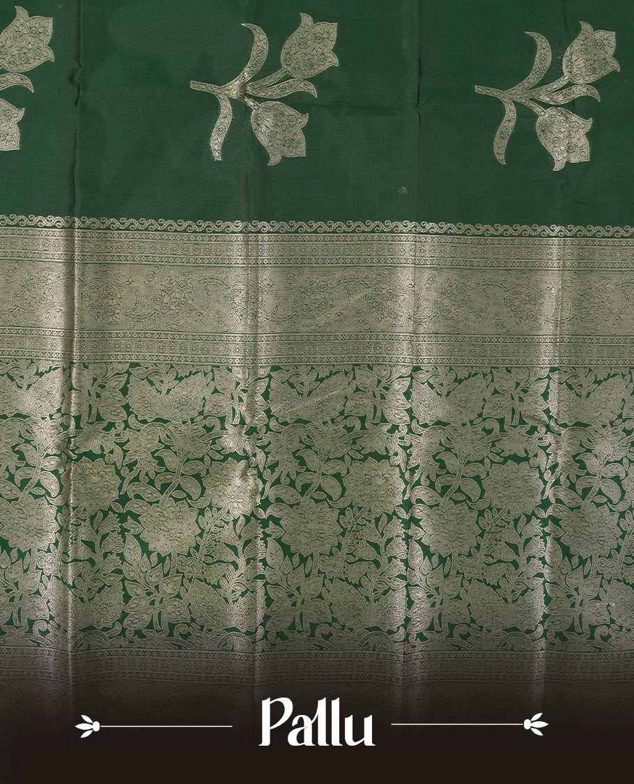 Bottle Green Semi Silk Saree with Silver Zari Floral Woven Pallu and Border, Subtle Zari Butta Motifs on the Body, Tassel Detailing, and Coordinated Blouse Piece