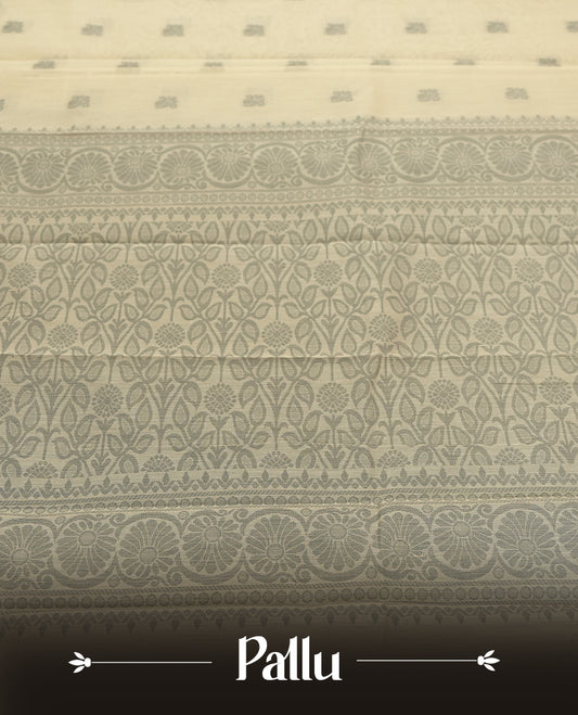 Sandal colour silk cotton saree featuring subtle elegant floral woven motifs on the body, complemented by a classic contrast grey colour border and pallu with intricate traditional detailing & Comes with a matching blouse piece.
