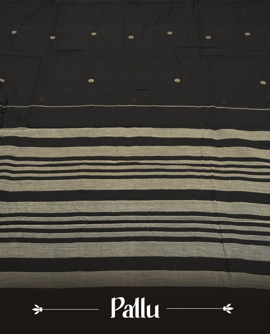 Black colour Narayanapattu cotton saree with floral motifs in the body & pallu featuring traditional temple and checkered motifs in beige colour threadwork, and a matching zari border & this saree comes without a blouse piece.
