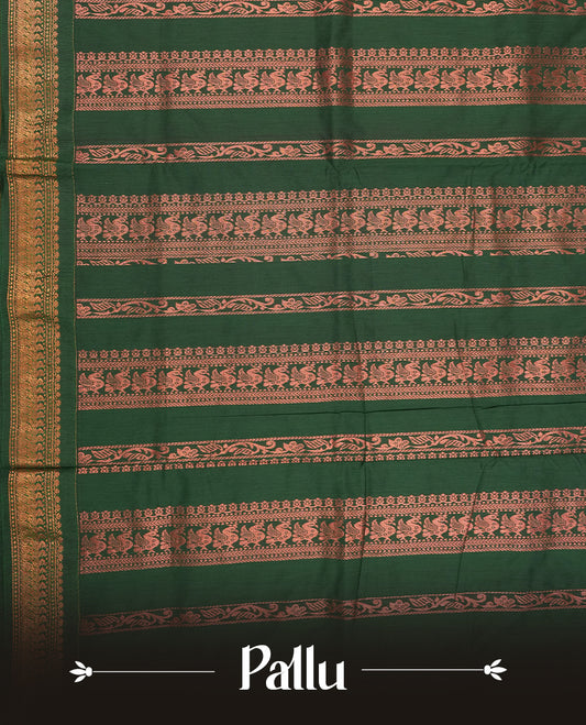 Maroon colour Kalyani cotton saree with  zari motifs all over, paired with a contrasting green rich peacock copper zari woven border and pallu & comes with a matching blouse piece.