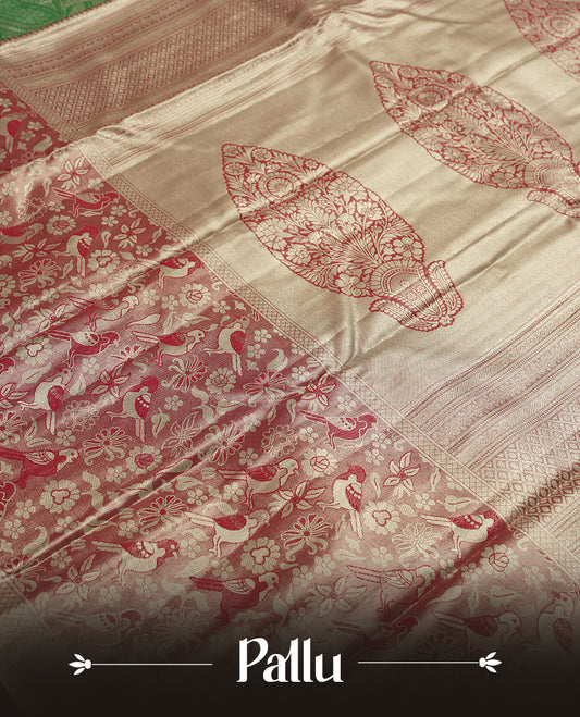 Bright green colour and Antique silver Zari Tissue Brocade Saree features intricate red coloured floral Motifs on body and fancy border & pallu with bird patterns, paired with matching blouse