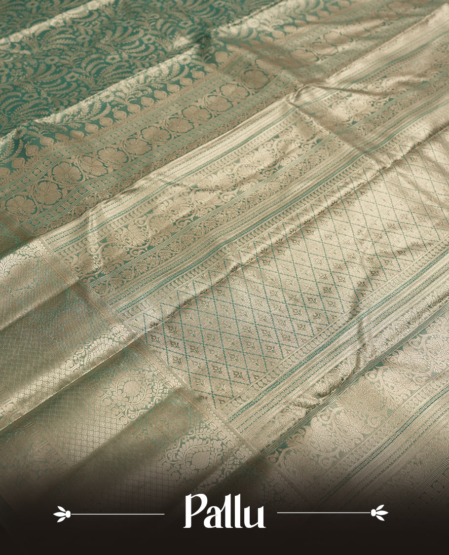 Seafoam green and Antique gold Zari Tissue Brocade Saree features intricate floral Motifs on body and traditional border & pallu with floral patterns, paired with matching blouse