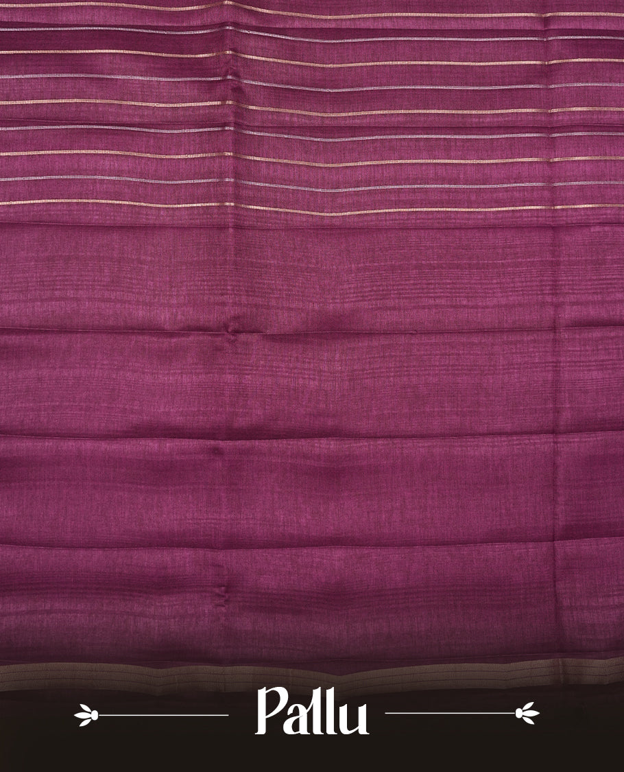 Purple colour semi tussar silk saree highlights gold and silver zari stripes across body,  border, pallu and paired with matching blouse piece.