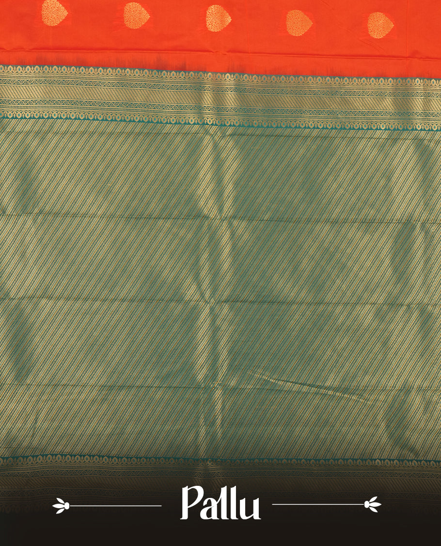 Red orange colour Semi Silk Saree with gold zari patterns on the body, paired with a contrasting Green traditional pallu and border, and a matching blouse piece.